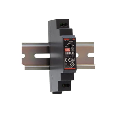 Mean Well HDR-15-12 strømforsyning til DIN-skinne med 17,5mm bredde, viser DC OK-indikator og justeringsknap.