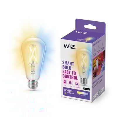 WiZ LED klar filament rørpære med E27 fatning og synlige LED tråde ved siden af dens WiZ smart-pære emballage. Pæren viser varmt og koldt lys på samme tid.