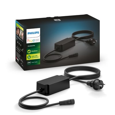 Philips Hue 40W udendørs strømforsyning og dens emballage vist sammen på en hvid baggrund.