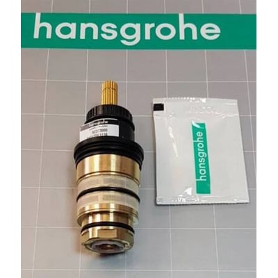 Hansgrohe termostatelement til termostatarmatur, vist med en lille hansgrohe-mærket pose ved siden af.