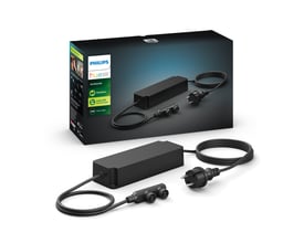 Philips Hue 100W udendørs strømforsyning i sort med tilbehør og emballage.