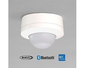 Niko M46HC DALI-2 bevægelsessensor til højloftsmontage med synlige DALI-2, Bluetooth og IEC logoer.