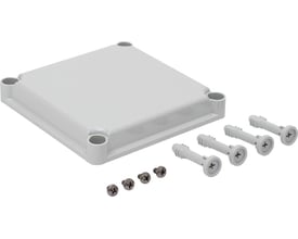 Nærbillede af Fibox EKH30-G dæksel med tilbehør, der viser de medfølgende skruer og rawplugs på en neutral baggrund.