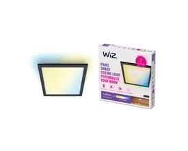 WiZ 30x30 cm LED-panel med sort ramme og en blanding af varmt og køligt lys, ved siden af produktets emballage.