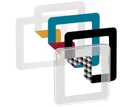 Lauritz Knudsen LK FUGA Choice design ramme i transparent akryl med forskellige farvede indlæg og et mønstret indlæg.