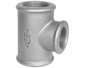 Georg Fischer galvaniseret tee-fitting af blødstøbt støbejern med tre muffede gevindender til 1¼" x 1" x 1¼" rør. Synlig GF+ logo.