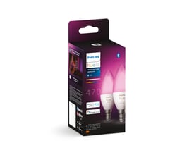Philips Hue E14 Color & White Ambiance pære-pakke med to kerteformede pærer i pink og lilla, præsenteret i en lilla og hvid papkasse.