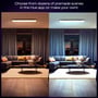 Philips Hue Aurelle loftpanel med to forskellige lysindstillinger: varm hvid til venstre og kølig hvid til højre, vist over en stue.