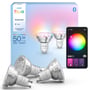 Philips Hue Essential GU10 LED-pærer i 3-pak, vist sammen med æsken og en smartphone-app, der viser farvevalg.