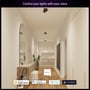 Styring af Philips Hue Essential pærer med stemmekommandoer i en moderne entré, kompatibel med Apple Home, Google Assistant, Alexa og Matter.